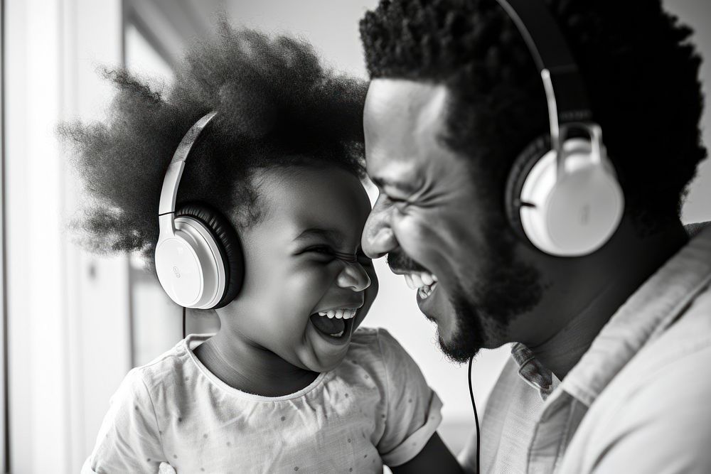 Black 4 year old girl with afro puff hair headphones portrait headset. AI generated Image by rawpixel.