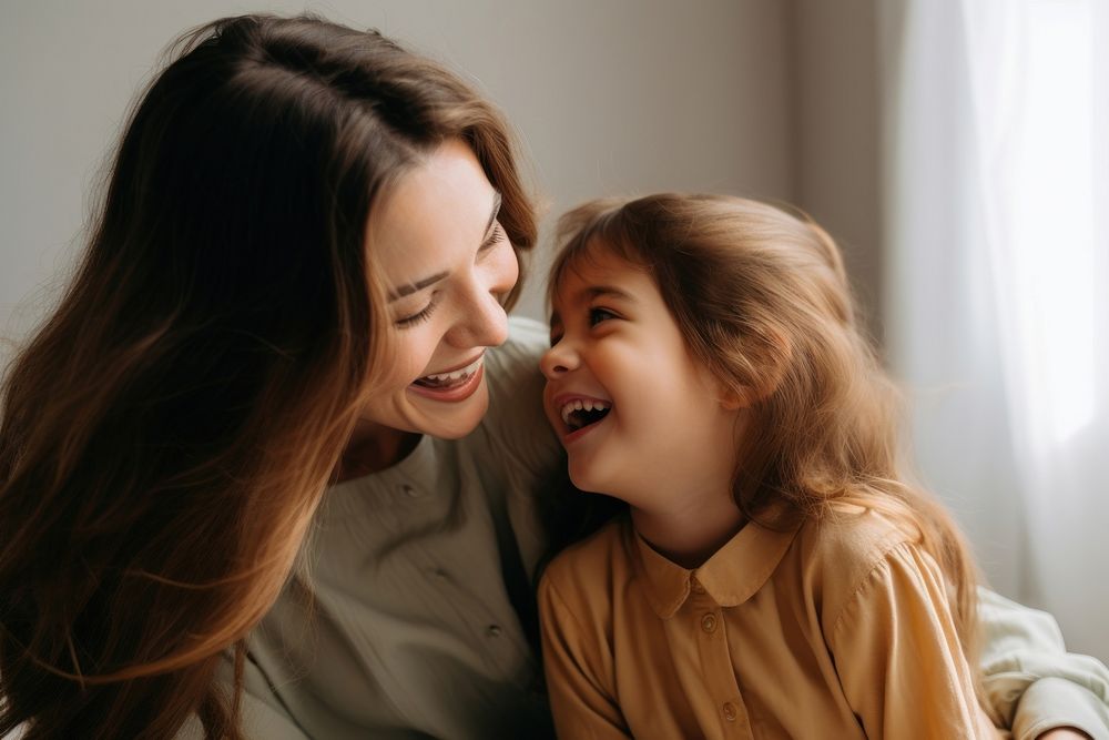 Mother and funny small preschooler daughter laughing smiling looking. AI generated Image by rawpixel.
