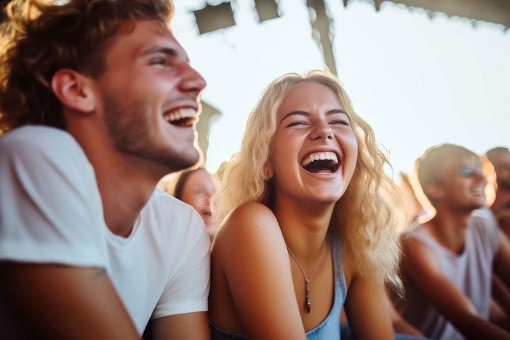 Young adults laughing in concert smiling summer event. AI generated Image by rawpixel.