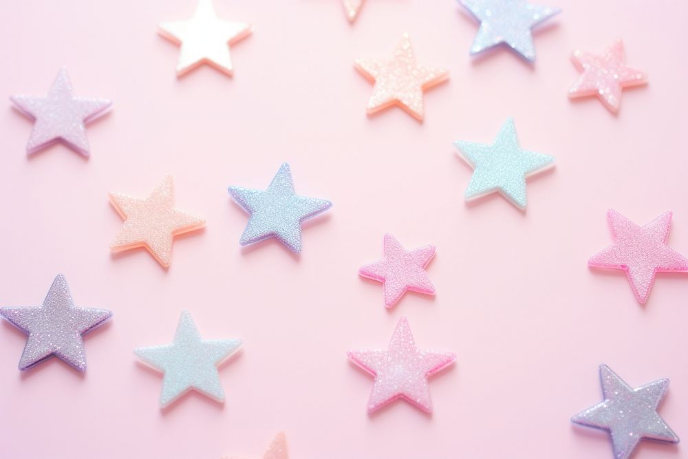 Pastel stars with sparkle background backgrounds celebration echinoderm. AI generated Image by rawpixel.