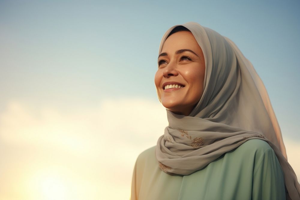 Middle age woman wearing hijab smiling smile scarf. AI generated Image by rawpixel.