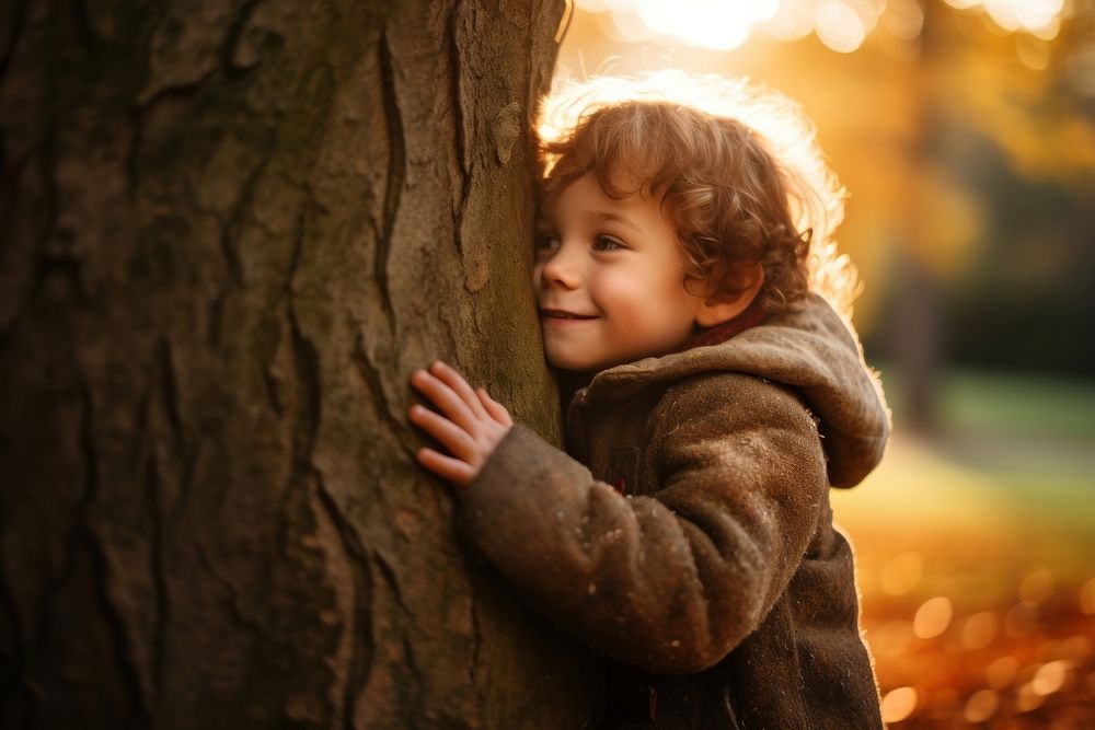 A child hugginf a Tree nature tree baby. AI generated Image by rawpixel.