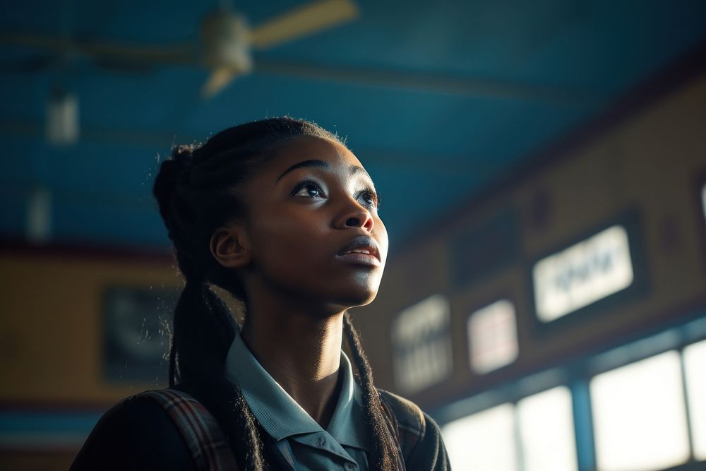 An african teenage woman in high school photography portrait contemplation. AI generated Image by rawpixel.