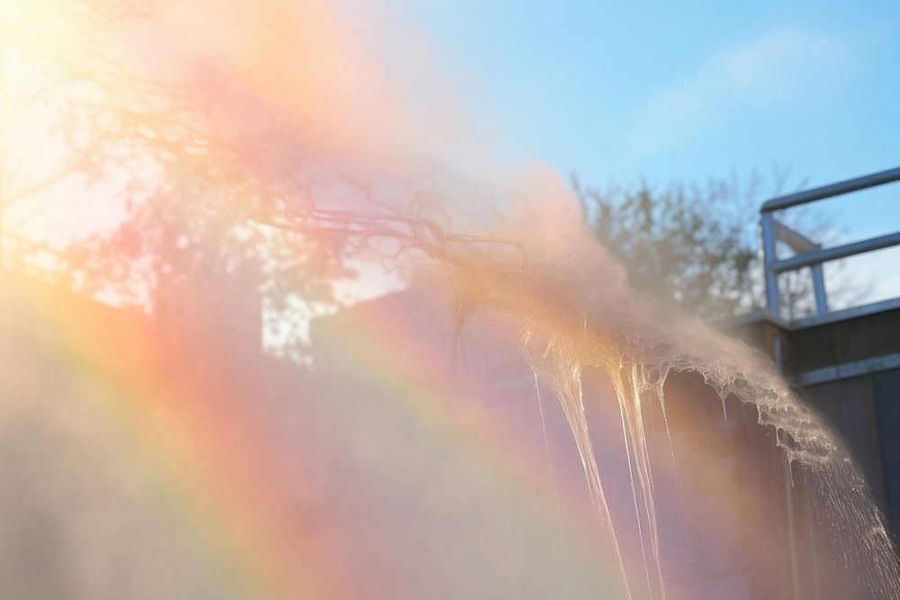 Water mist with rainbow architecture outdoors nature. AI generated Image by rawpixel.