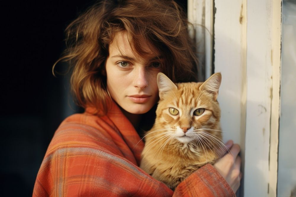 A cool woman carrying a cat photography portrait animal. AI generated Image by rawpixel.