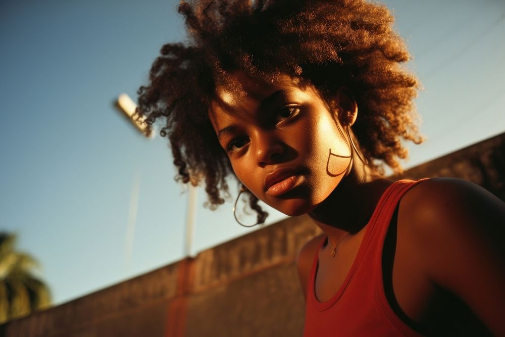 A black teenage girl playing sport photography portrait accessories. AI generated Image by rawpixel.
