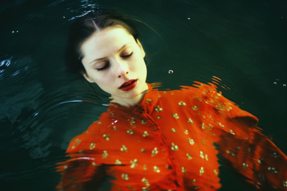 A woman in the pond photography portrait swimming. AI generated Image by rawpixel.