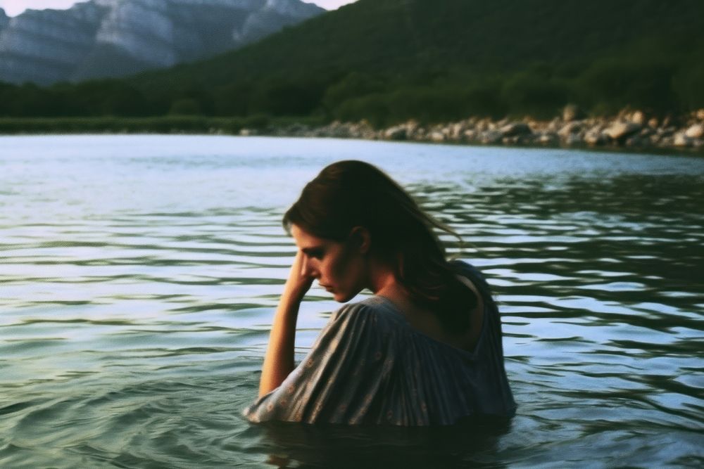 A woman in the river photography portrait outdoors. AI generated Image by rawpixel.