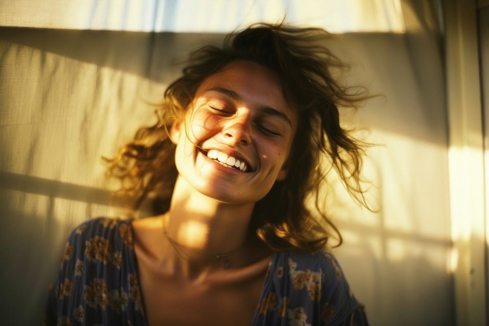 A woman smile to the sun light laughing adult relaxation. AI generated Image by rawpixel.