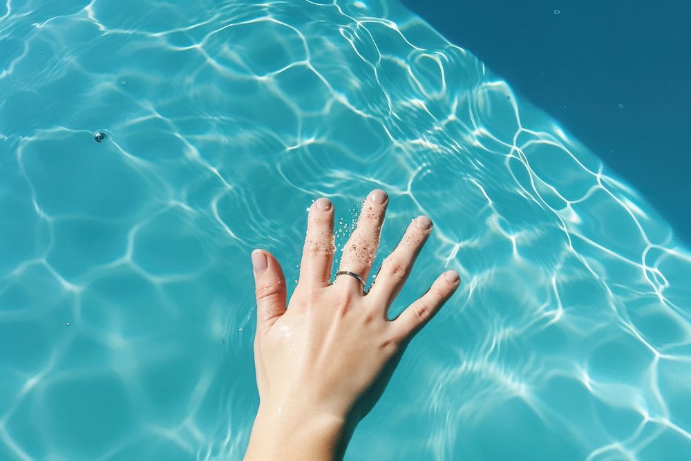 Hand on the pool swimming outdoors finger. AI generated Image by rawpixel.