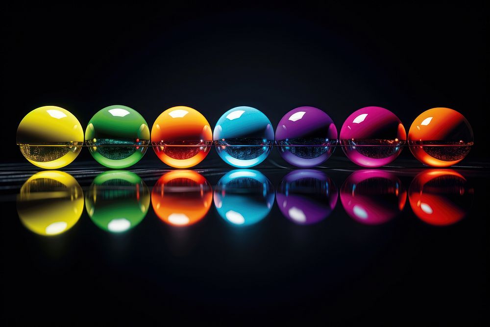 Multicolor reflections effect sphere arrangement illuminated. AI generated Image by rawpixel.