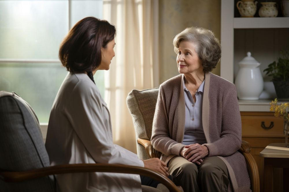 Senior woman talking with her doctor conversation adult contemplation. AI generated Image by rawpixel.