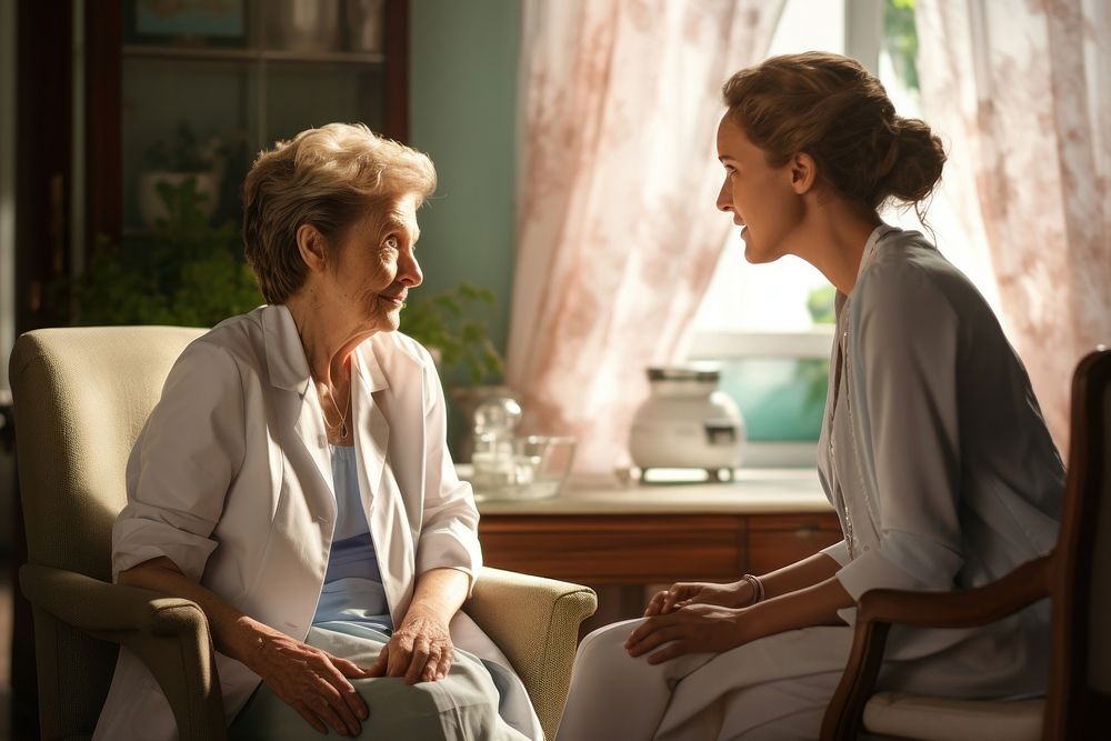Senior woman talking with her doctor conversation adult contemplation. AI generated Image by rawpixel.