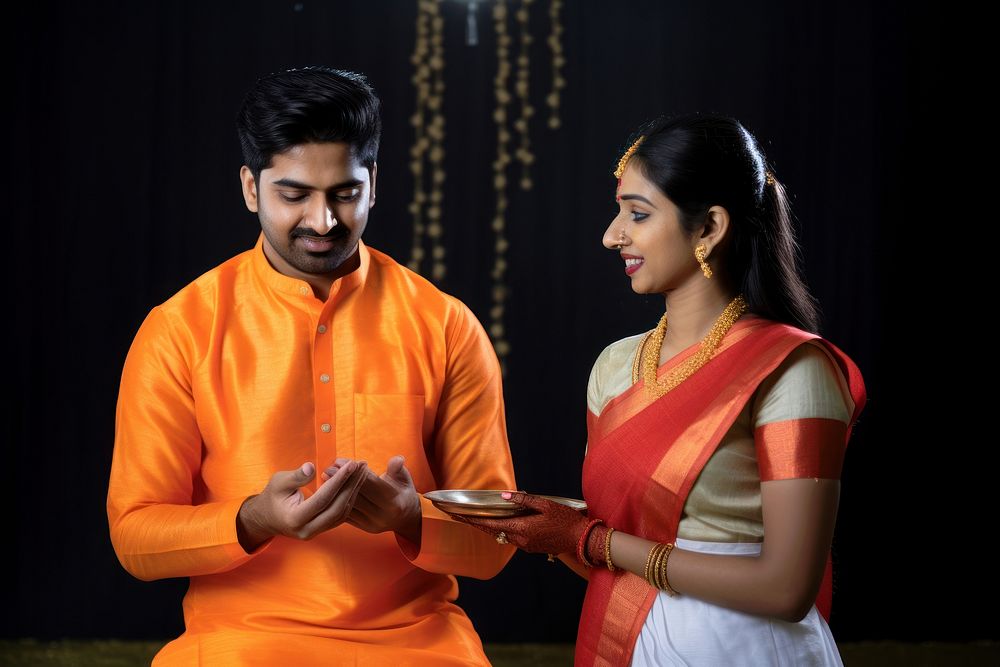 An indian couple getting marry jewelry adult woman. 