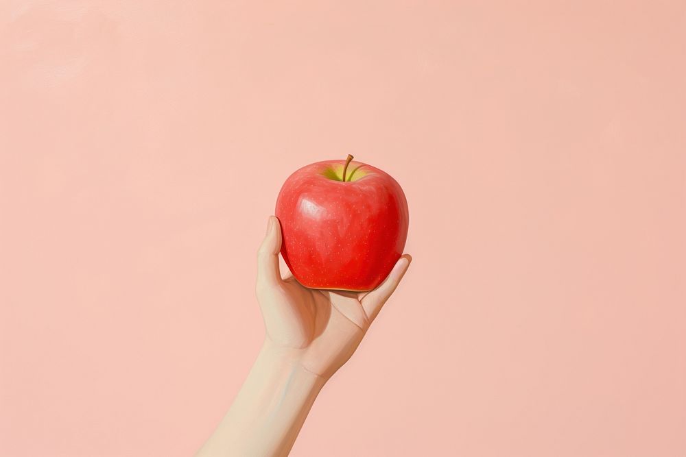 A hand holding apple fruit plant food. AI generated Image by rawpixel.