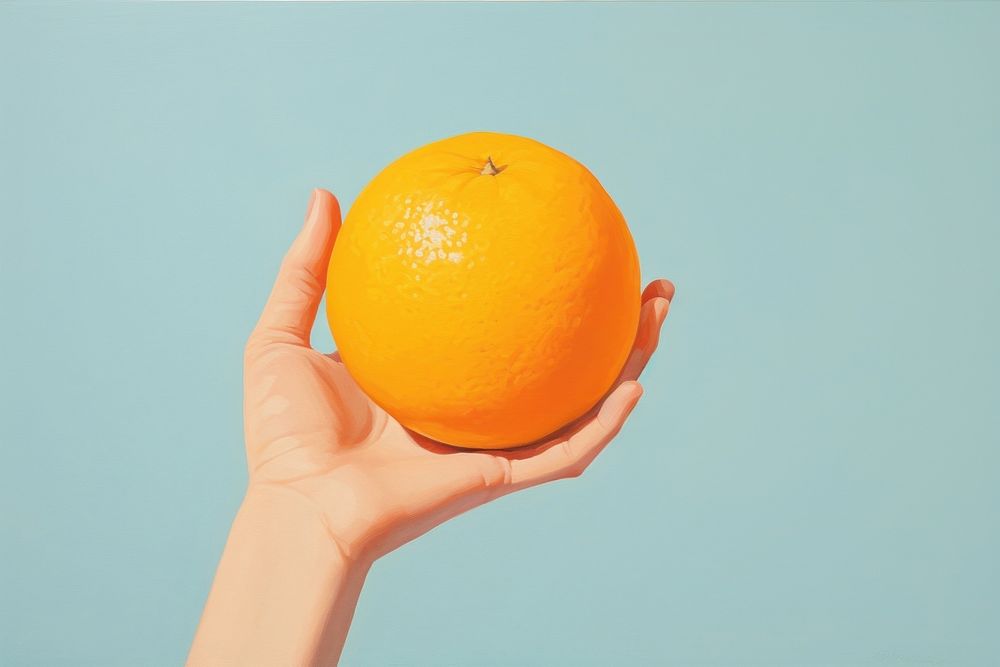 A hand holding orange juice grapefruit plant food. AI generated Image by rawpixel.