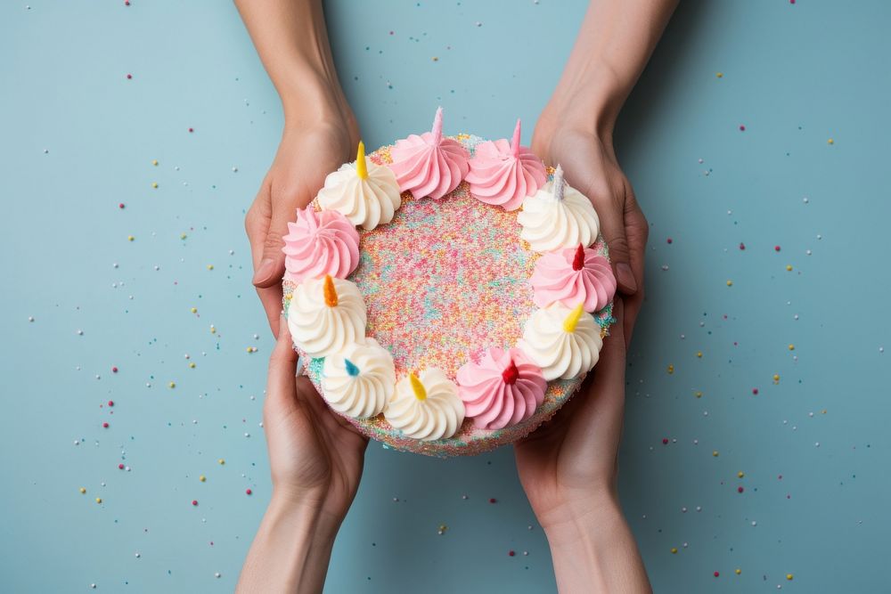 Hands holding birthday cake dessert food anniversary. AI generated Image by rawpixel.