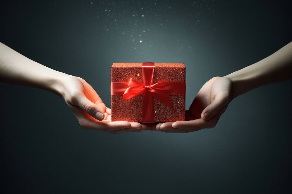 Hand holding gift box celebration. AI generated Image by rawpixel.
