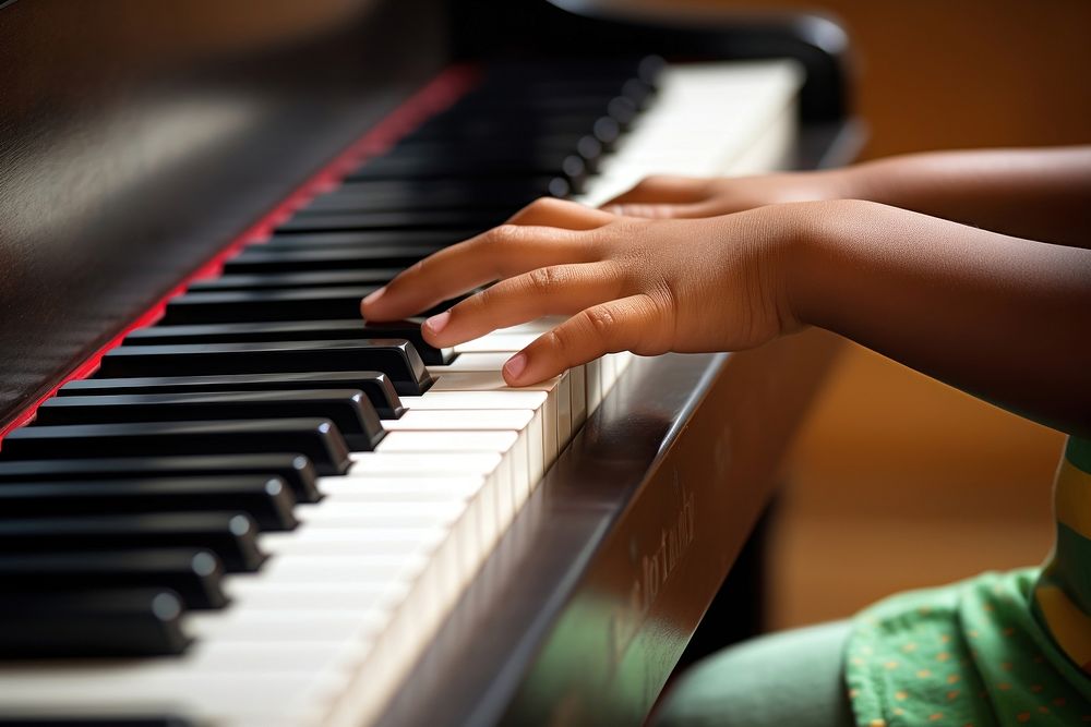 Child hands practice piano keyboard concentration harpsichord. AI generated Image by rawpixel.