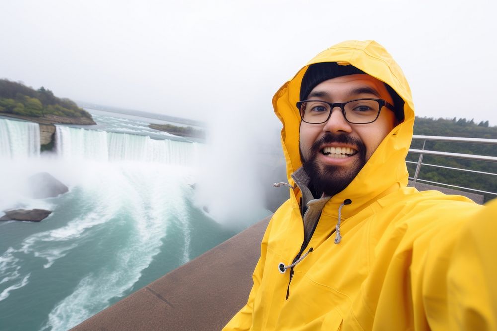 Niagara Falls raincoat portrait architecture. AI generated Image by rawpixel.