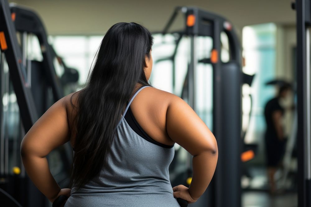 Chubby young indian woman gym exercise fitness. AI generated Image by rawpixel.