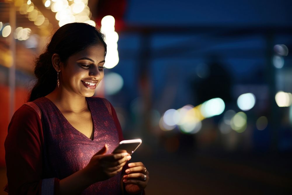 Indian woman smiling adult light phone. AI generated Image by rawpixel.