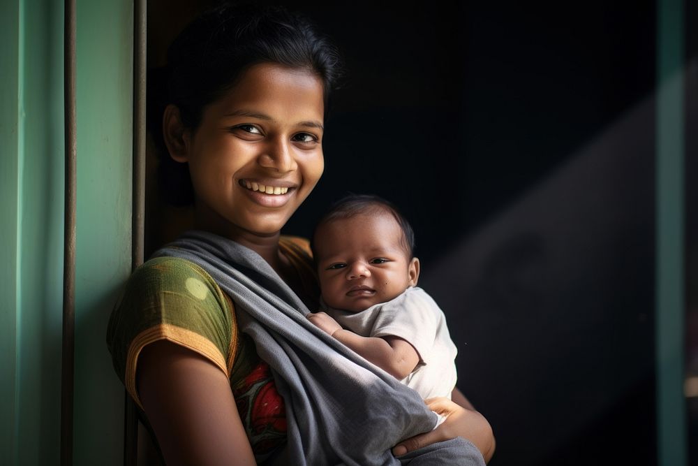 Indian woman smiling baby portrait people. AI generated Image by rawpixel.