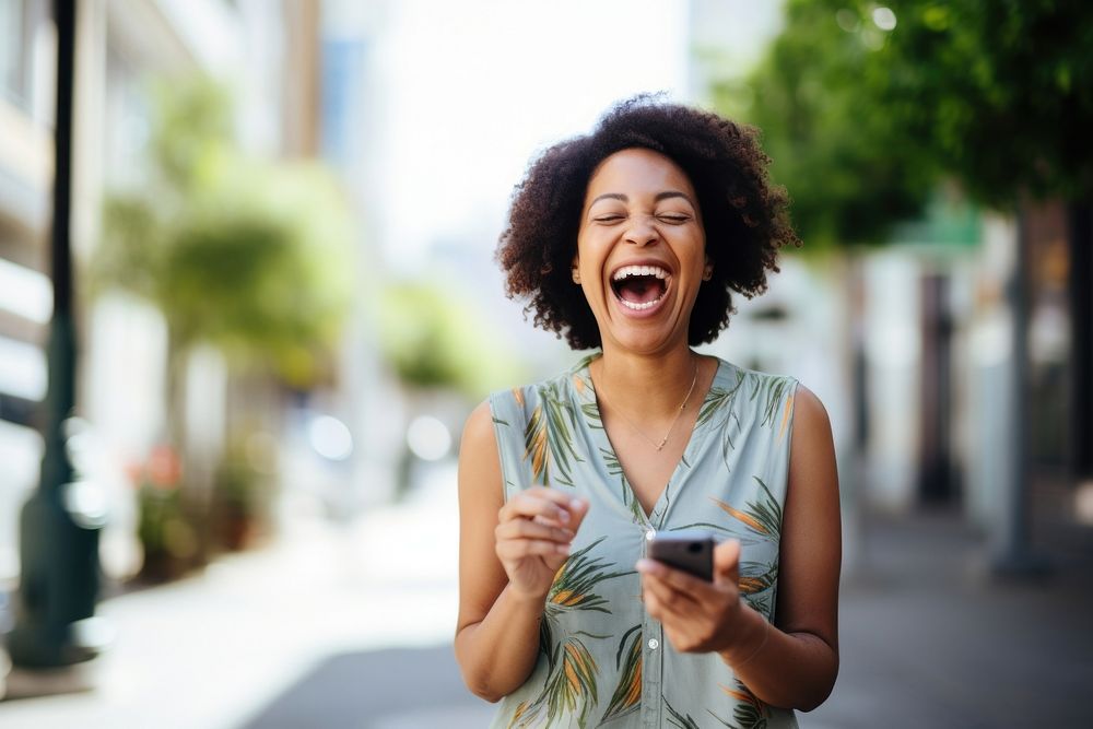 Video chat in smart phone laughing adult woman. AI generated Image by rawpixel.