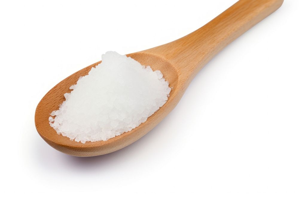 Salt in wooden spoon white food white background. AI generated Image by rawpixel.