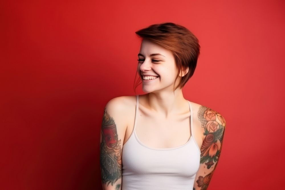 Young woman tattoo portrait laughing. AI generated Image by rawpixel.