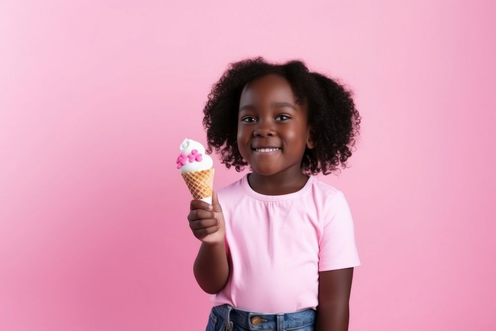 Black little girl dessert holding child. 