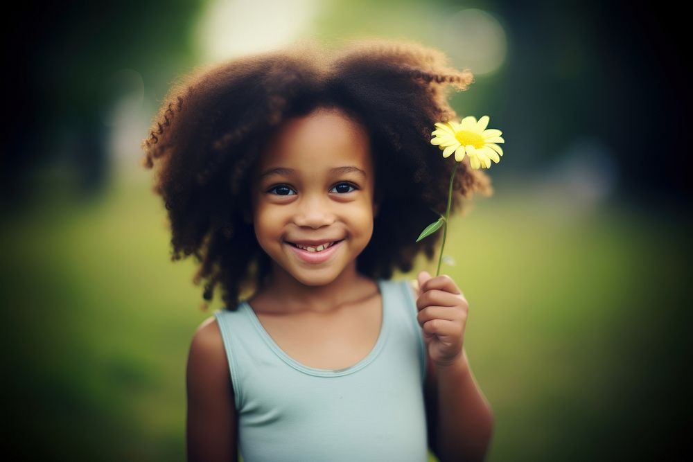 Black little girl flower smile | Premium Photo - rawpixel