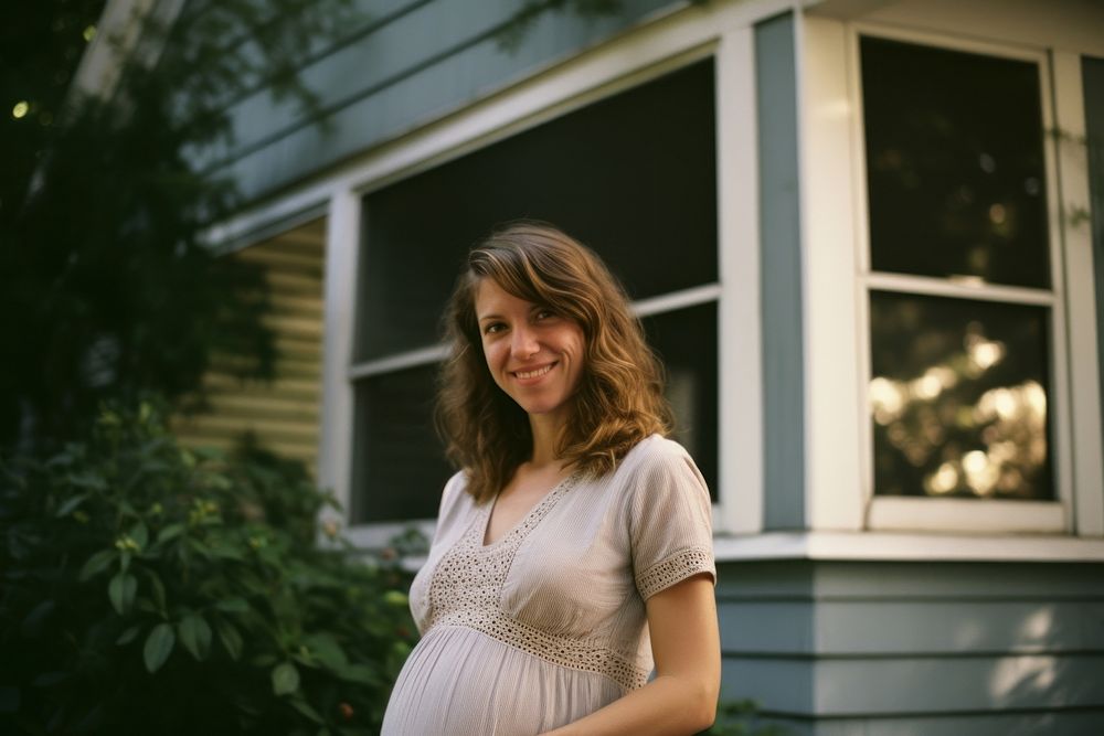 Pregnant woman portrait smiling adult. AI generated Image by rawpixel.