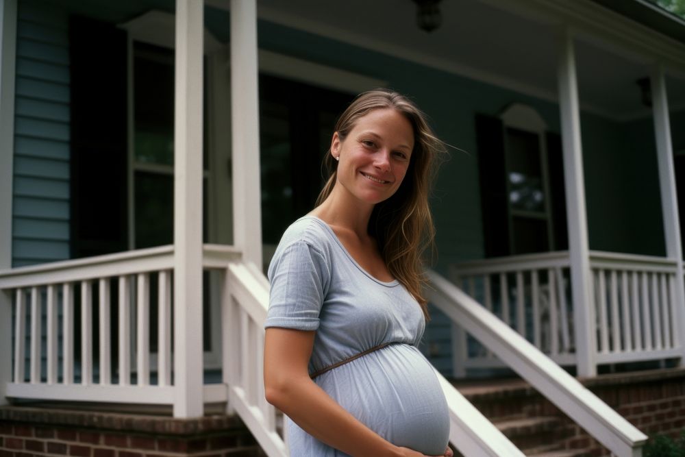 Pregnant woman architecture portrait smiling. AI generated Image by rawpixel.