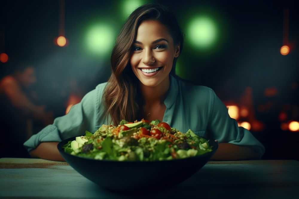 Woman eating a dish of salad portrait adult smile. AI generated Image by rawpixel.
