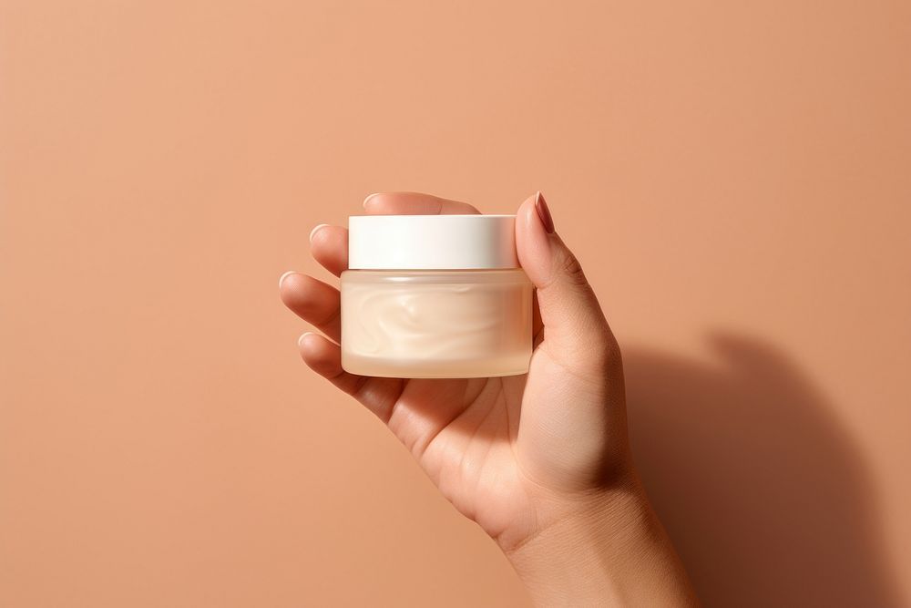 Moisturizer container hand cosmetics holding. AI generated Image by rawpixel.