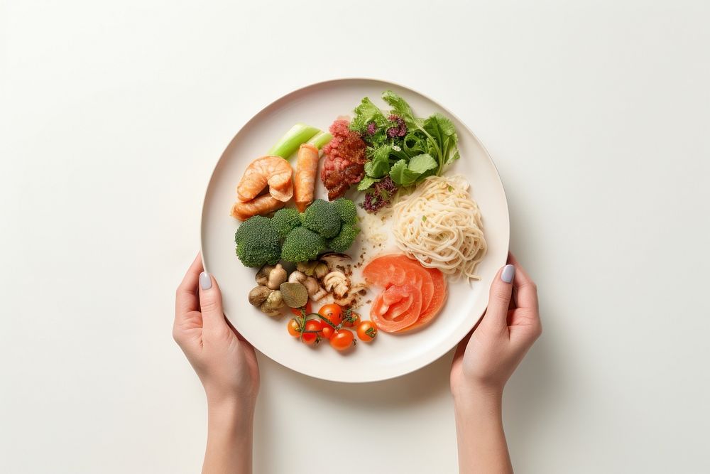 Hands holding healthy food on plate adult meal dish. AI generated Image by rawpixel.