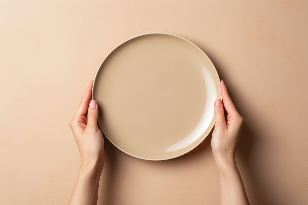 Plate holding hand food. AI generated Image by rawpixel.