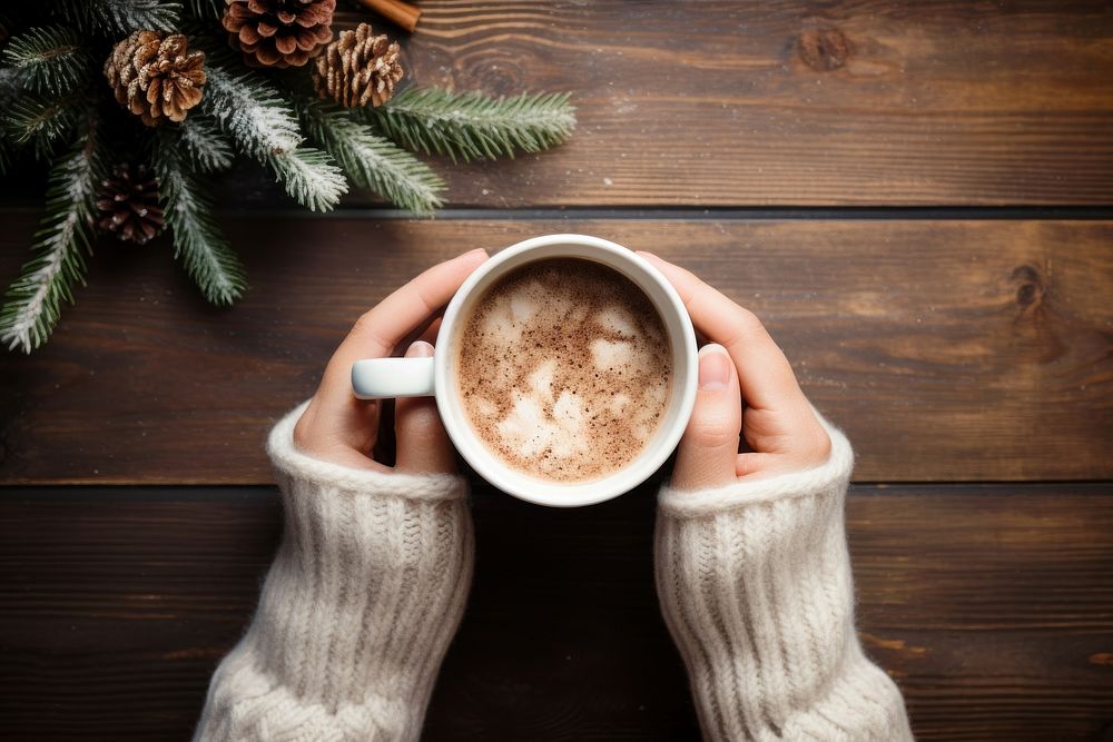 Hands holding coffee mug christmas drink wood. AI generated Image by rawpixel.