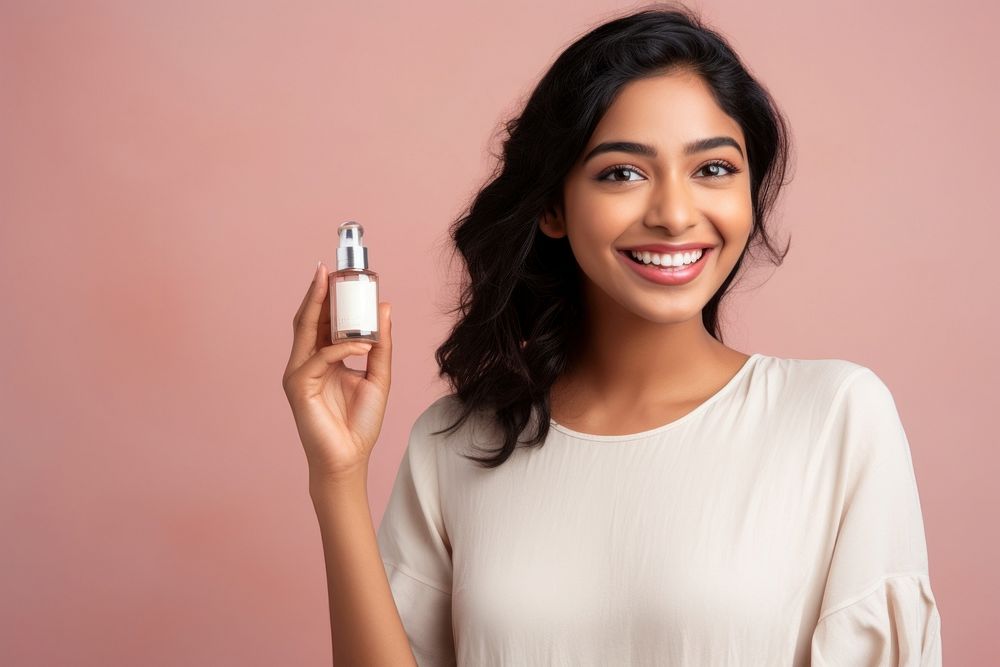 North indian woman cosmetics perfume smiling. AI generated Image by rawpixel.