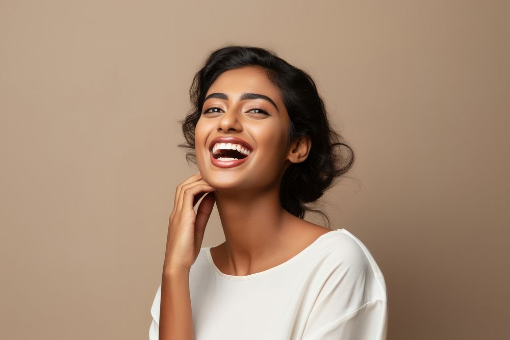 South indian woman laughing smiling smile. AI generated Image by rawpixel.