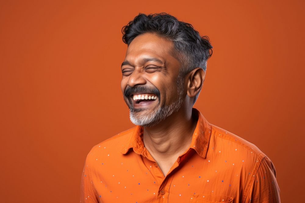 South Indian man portrait laughing smiling. AI generated Image by rawpixel.