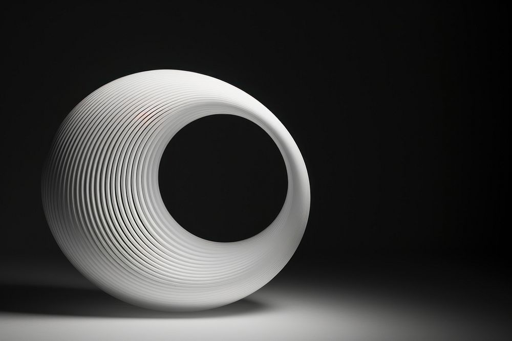 A black and white photo of a circular object monochrome darkness lighting. AI generated Image by rawpixel.