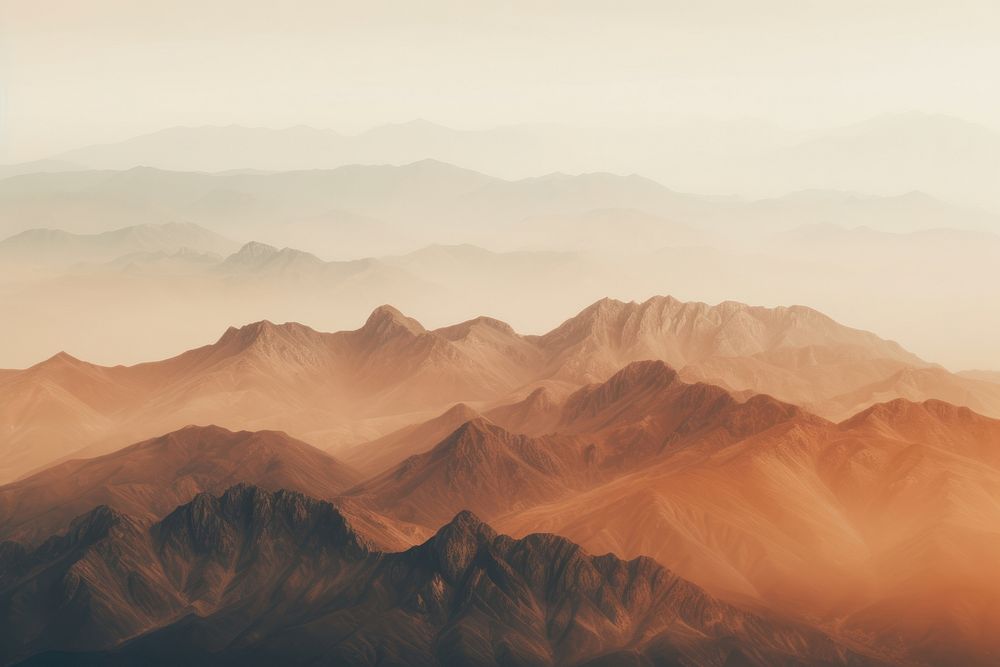 Aerial brown mountains landscape panoramic outdoors. AI generated Image by rawpixel.