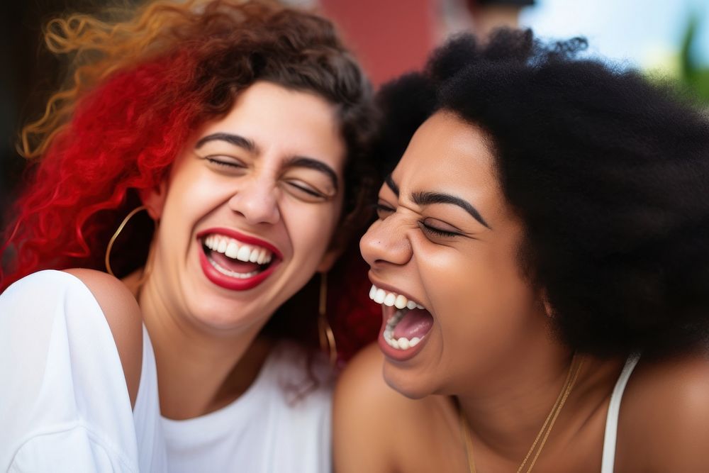 Two Latinx laughing together adult togetherness affectionate. AI generated Image by rawpixel.