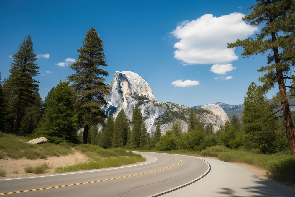 Winding road with half dome in yosemite outdoors highway nature. AI generated Image by rawpixel.