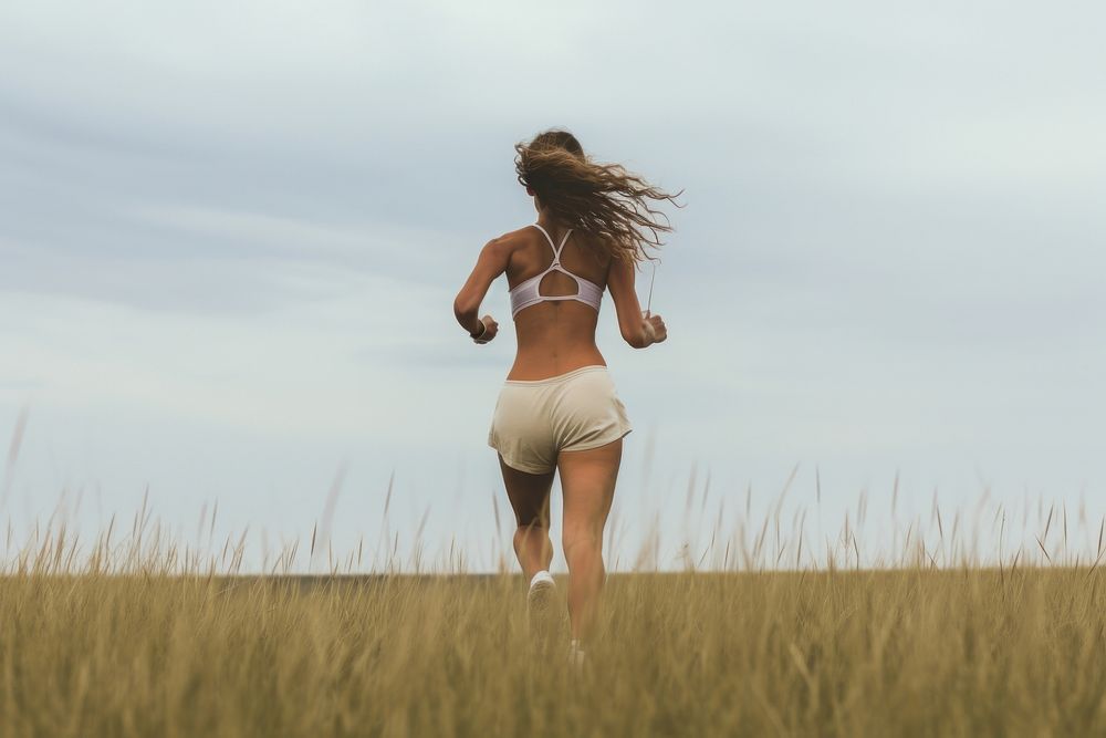 Woman running outdoor outdoors adult woman. AI generated Image by rawpixel.