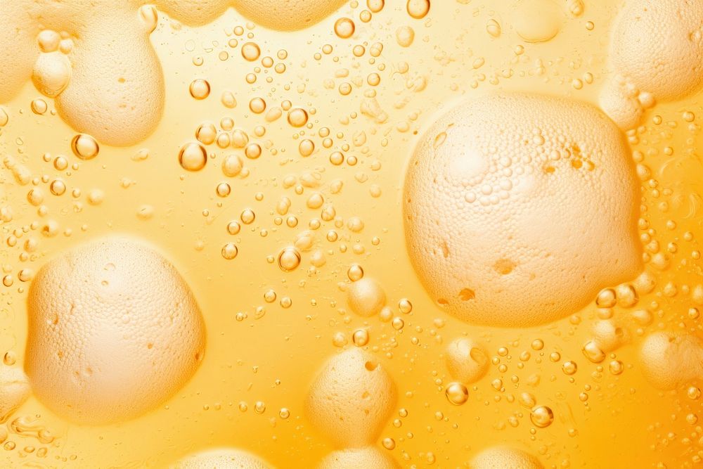 Beer bubbles in glass cup backgrounds condensation transparent. AI generated Image by rawpixel.