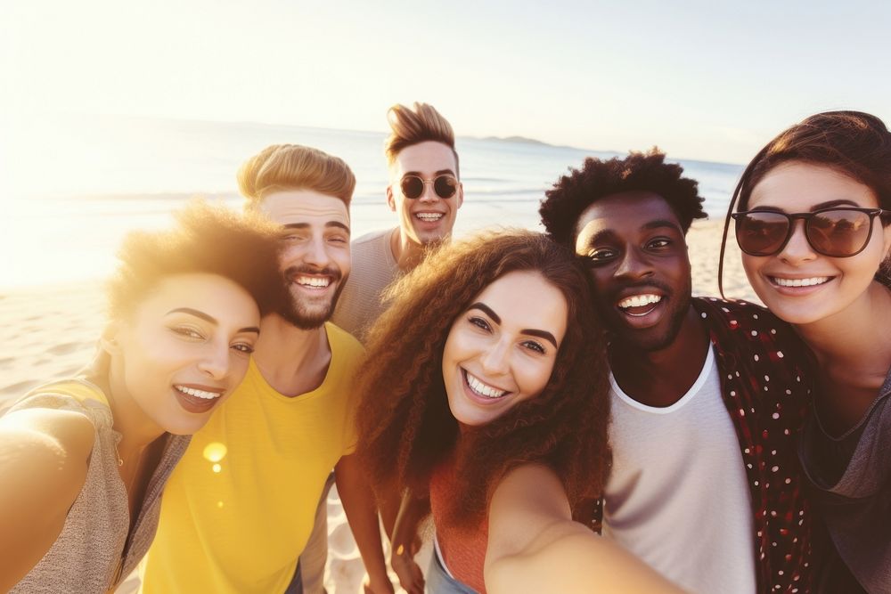 Group of friends taking selfie on sunny beach laughing glasses adult. AI generated Image by rawpixel.
