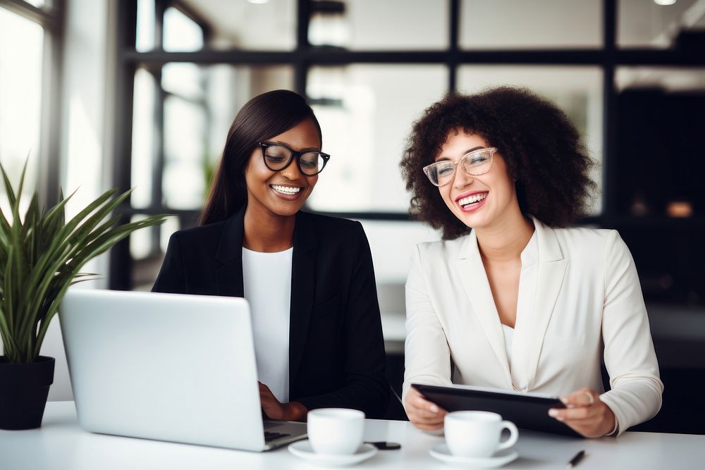 Happy multiethnic smiling business women working together in office computer glasses laptop. AI generated Image by rawpixel.